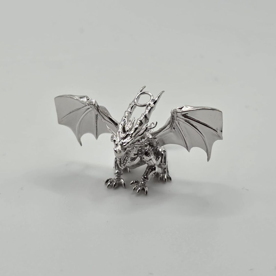 3D-designed pendant with a loop integrated into the model for seamless chain mounting.