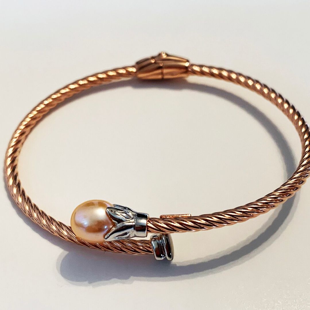 Twisted sterling silver and pearl bracelet by AMYKORYLINE