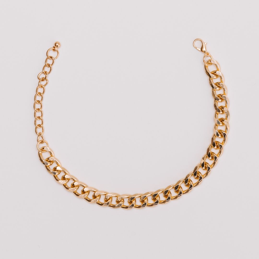 Gold chain bracelet cast using the lost wax technique, showcasing a polished yellow gold finish.