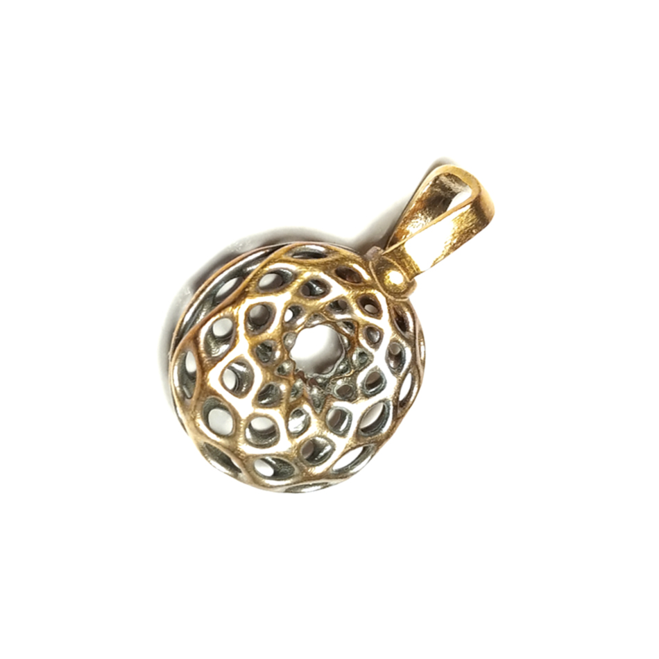 Complex lattice sphere bronze pendant created using lost wax casting for jewelry design
