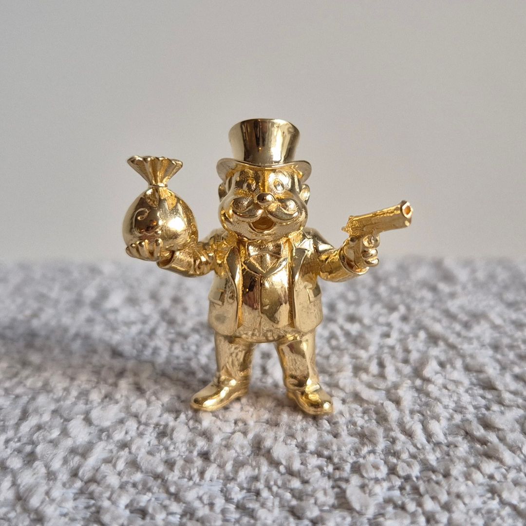 Finished Mr. Moneybag figurine cast in 18k gold-plated brass by Castimize.